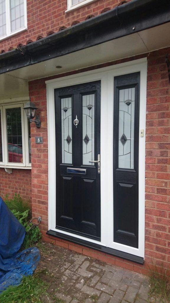 Black GRP door with side panel Composite door with side panel